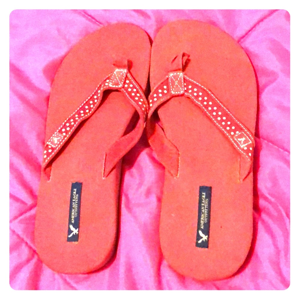 Pink polka dot flip flops